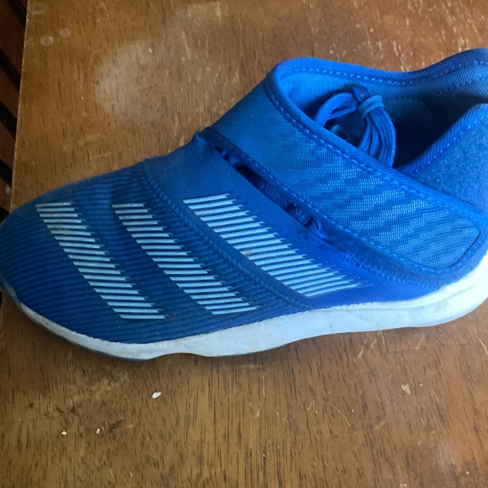ADIDAS, youth size 5, bought for my grandson worn twice before he outgrew them.